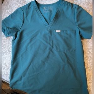 Like new size medium Caribbean blue 2 pocket Figs scrub top